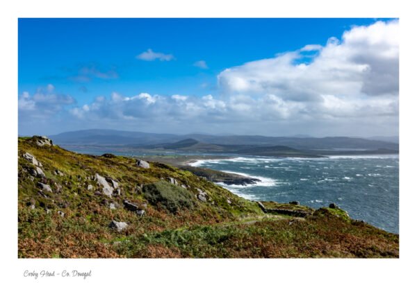Crohy Head, located near Maghery in County Donegal, is home to one of Ireland’s most spectacular coastal landscapes.  The rolling mountains of Donegal form a dramatic, serene background, with a blue sky and rough sea.